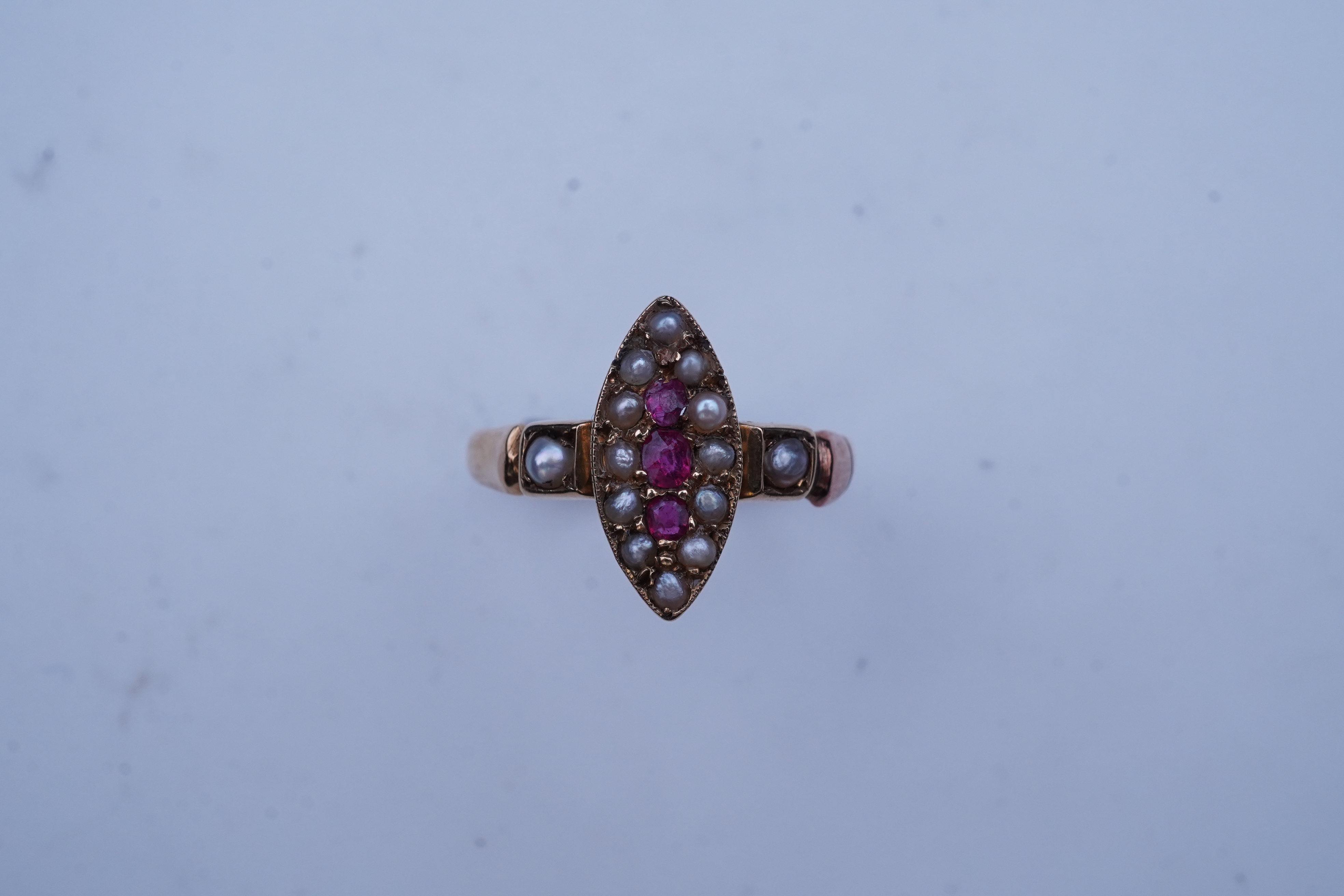 A Victorian ruby and seed pearl ring, circa 1876